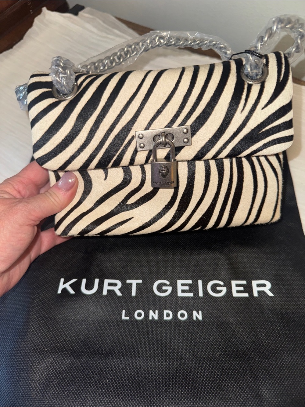Kurt Geiger Zebra-Print Lock Shoulder Bag in Black and Cream